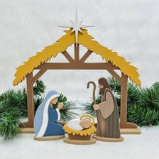 A Nativity scene showing Joseph beside Mary and the infant Jesus