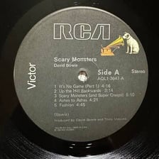 A vinyl record or sleeve marked “Side A.”