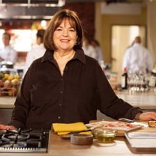 Ina Garten presenting food in a kitchen setting