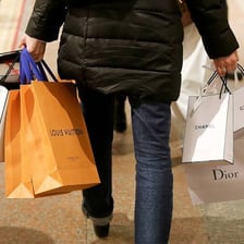 A shopper making an extravagant luxury purchase