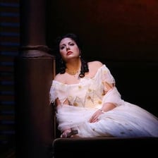 A theatrical performance depicting Violetta in La Traviata