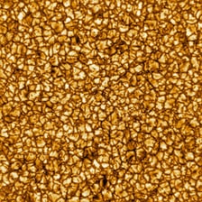 A detailed image of the Sun’s glowing, textured surface.