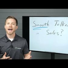 A salesperson speaking confidently to a customer.