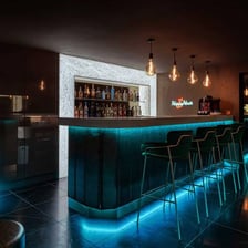 A bar interior prepared for happy hour