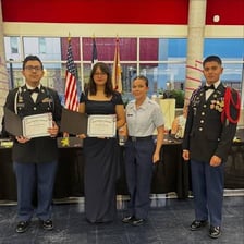 A person receiving an honor at an award ceremony