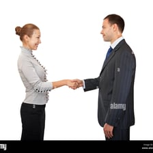 A man and woman exchanging a formal greeting.