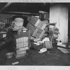 Shelves of preserved historical records in an archive