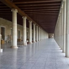 Colonnaded portico representing an ancient Greek stoa.