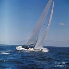 A yacht sailing across open water