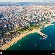 An aerial view of the blue Mediterranean Sea along a coastline.