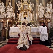 A Catholic high mass being celebrated at an altar