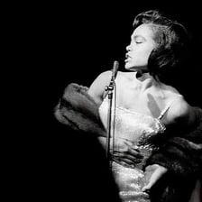 Eartha Kitt performing or posing for a portrait