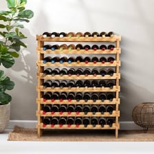 A wine rack holding several bottles horizontally