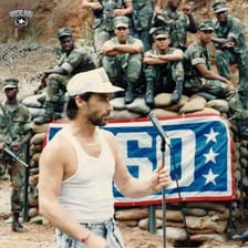 Country singer Lee Greenwood performing onstage.