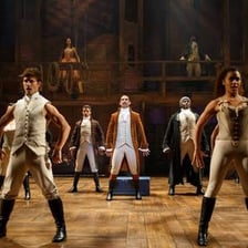 A theatrical production on a Broadway-style stage