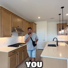 A playful person revealing a successful harmless prank.