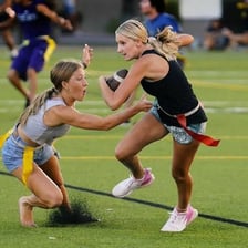 Students playing an intramural sports game within their school.