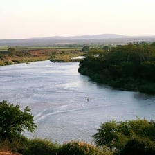 A river flowing through a landscape.