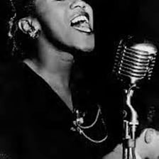 Ella Fitzgerald performing onstage