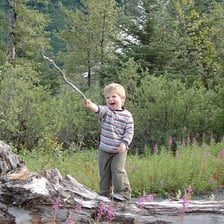 Children playing energetically outdoors