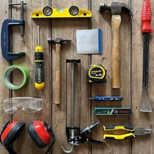 A home workshop with tools and materials for a do-it-yourself project