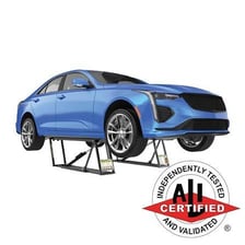 A hydraulic lift elevating a vehicle