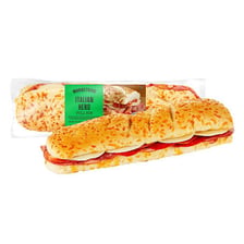 A long submarine-style sandwich filled with meats, cheese, and vegetables.