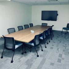 An empty meeting room after an event has finished.