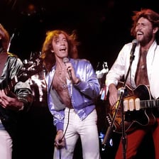 The Bee Gees performing onstage