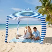 Rain falling on an outdoor picnic setup.