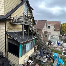 Two houses standing immediately next to each other.