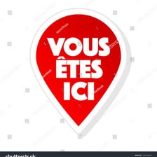 A simple French-language learning illustration for the word meaning here