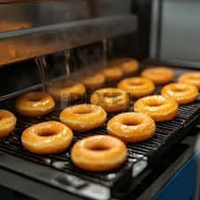 Donuts arranged in groups of twelve.