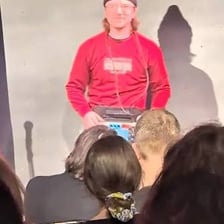 A comedian facing an unresponsive audience after a joke.