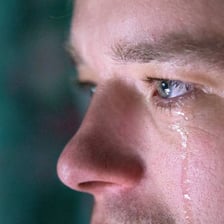 Person visibly crying