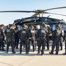 A uniformed group representing an organized police unit.