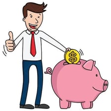 A person putting money into a piggy bank