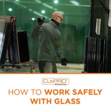 A person cautiously handling a fragile glass object