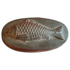 A decorative mold used to shape aspic or gelatin.