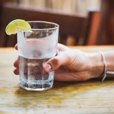 A glass of water in a Mexican setting
