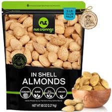 Almonds shown both in their shells and shelled