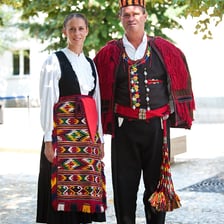 People in traditional clothing representing Slavic cultures