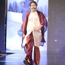 A stylish person posed with confidence and flair