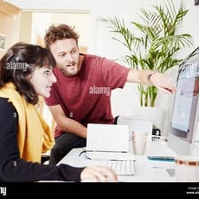 Two people collaborating as partners