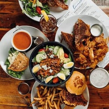 A variety of prepared foods arranged on a table