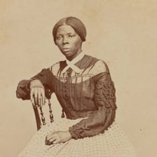 A historical portrait of abolitionist Harriet Tubman.