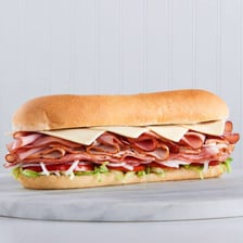 A submarine-style deli sandwich on a long roll