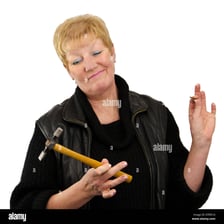 A person making a dismissive gesture with an annoyed expression.