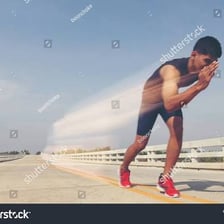 A person charging forward at a fast pace