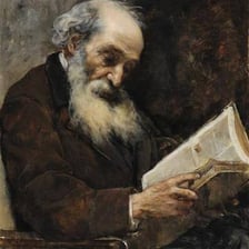 A person perusing an open book.